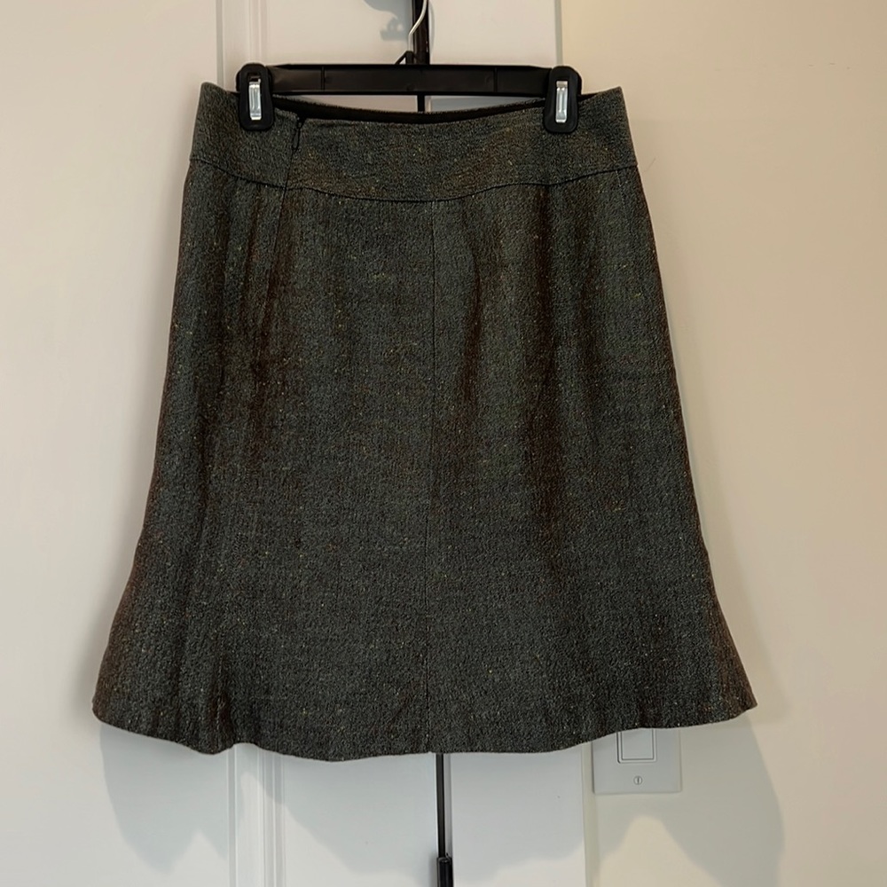The Limited brand.  A nice skirt with a flare.  Size 6 has tiny dots.